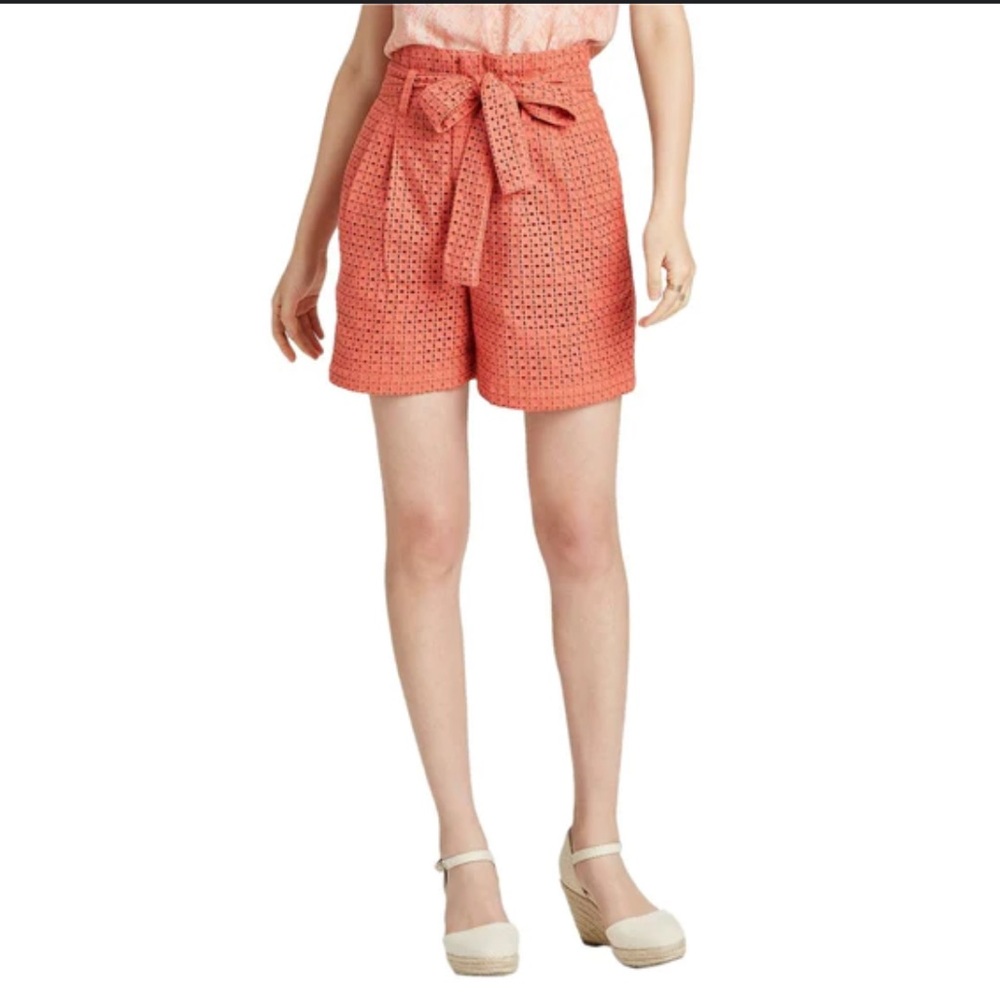 A new day high waisted, eyelet shorts in coral. Size 8. Like new.